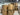 Wholesale liquidation truckload - Amazon RAW HPC LEX-2 sealed pallets stacked in Dallas TX warehouse