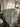 Wholesale liquidation pallet - branded furniture stretch-wrapped on warehouse racking in Dallas TX, bulk resale furniture load